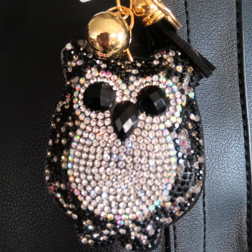 A crystal embellished owl purse charm/key chain